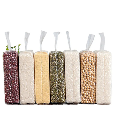Billige transparente Nylon-Plastik-Verpackungstüte mit starker Seitenverbindung 1 kg/100 kg Vakuumverpackungstüten für Reisfutter