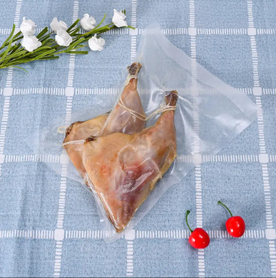 Großhandel 3 Seiten versiegelter Vakuum-Packsack Fabrikpreis Nahrungsmittelqualität Nylon Retort Tasche für Tiefkühlprodukte mit Tränenknochen