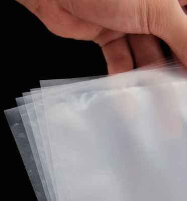 Professionelle Lieferung kundenspezifische Feuchtigkeitsdichte Vakuumspeicherbeutel für Lebensmittel Vakuumsäcke Lebensmittelklare Co-extrudierte Vakuumsäcke