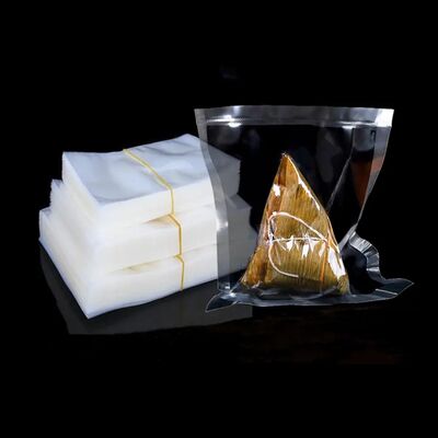 Fabrik-Direktverkauf von kundenspezifischen, dreiseitigen, versiegelten Nylon-Lebensmittelverpackungstaschen, hochtransparenten Vakuum-Lebensmitteltaschen, PE-Plastiktaschen, 100 Stück