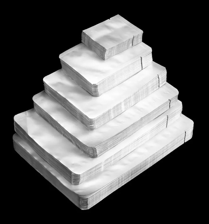 Silberfarbenes großes Vakuum-Siegelbeutel Aluminiumfolie Lebensmittelverpackungstüten Vakuum-Wärmesiegel